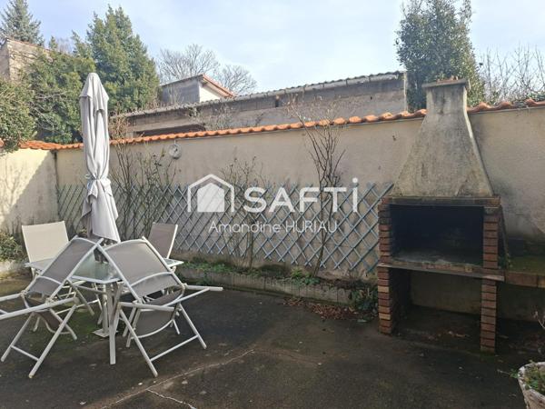 Maison familiale 146m2 à Aigueperse - centre ville - double garage et cour extérieure