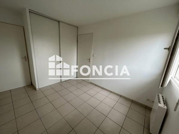 Location Appartement 2 pièces 42.5 m² - 21 AVENUE DES NATIONS Onet Le Chateau 12850