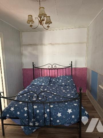 Maison avec 2 chambres, jardin et dépendance