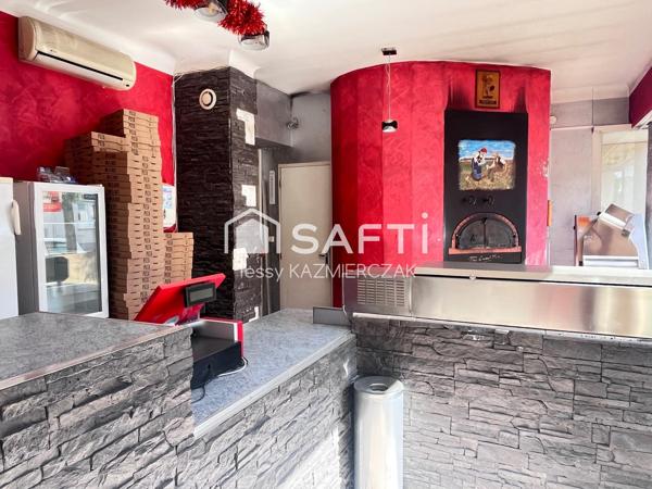 Immeuble avec local commercial et appartement T2 à Sarralbe