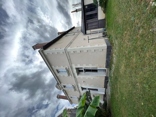 Maison plein centre ville jardin avec garage fermé