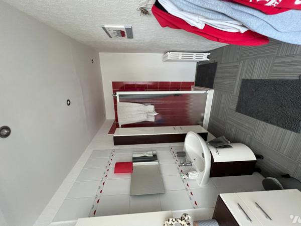 Maison plein centre ville jardin avec garage fermé