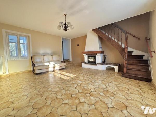 Maison à fort potentiel avec jardin et garage en centre-ville de Savenay