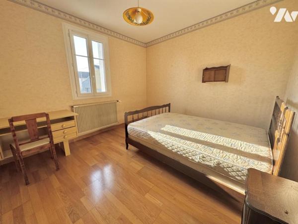 Maison à fort potentiel avec jardin et garage en centre-ville de Savenay