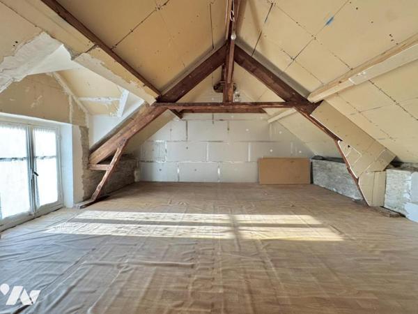 Maison à fort potentiel avec jardin et garage en centre-ville de Savenay