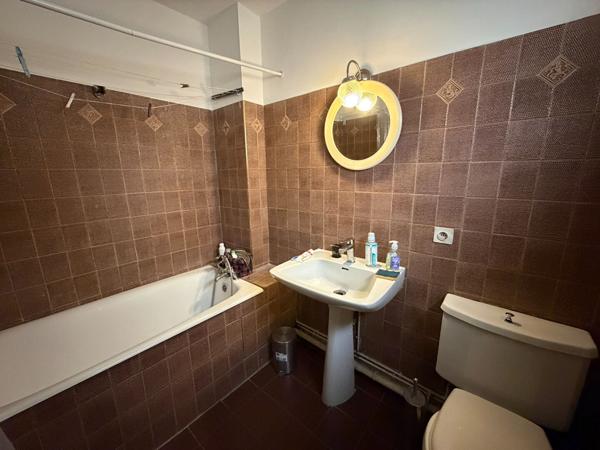 Maison de caractère à vendre dans la Bastide de Carcassonne avec patio, toit terrasse et 4 chambres