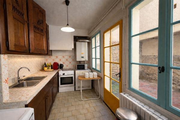 Maison de caractère à vendre dans la Bastide de Carcassonne avec patio, toit terrasse et 4 chambres
