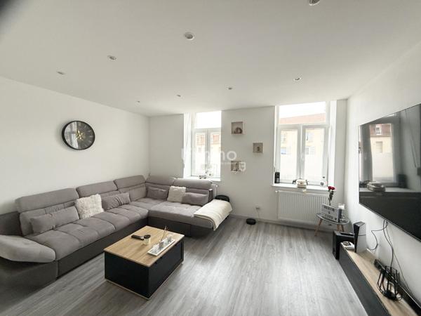 Vends à Boulay, immeuble avec magasin + appart. neuf 100m2