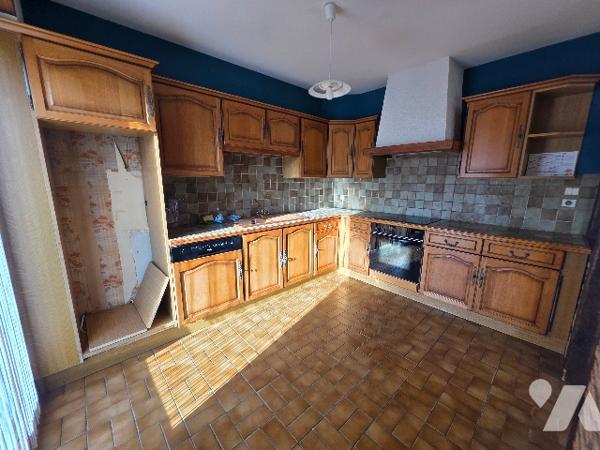 Maison mitoyenne d'environ 100m² habitables