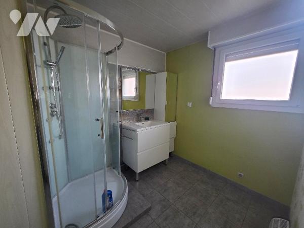 Maison mitoyenne d'environ 100m² habitables