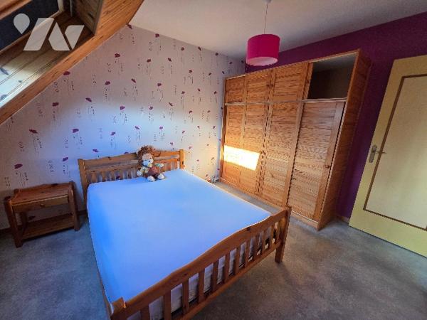 Maison mitoyenne d'environ 100m² habitables