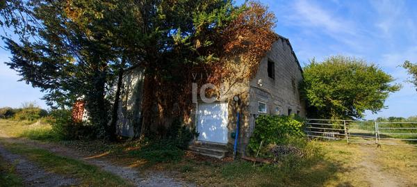 Ancienne étable à réhabiliter avec hangars sur 2 hectares de terrain