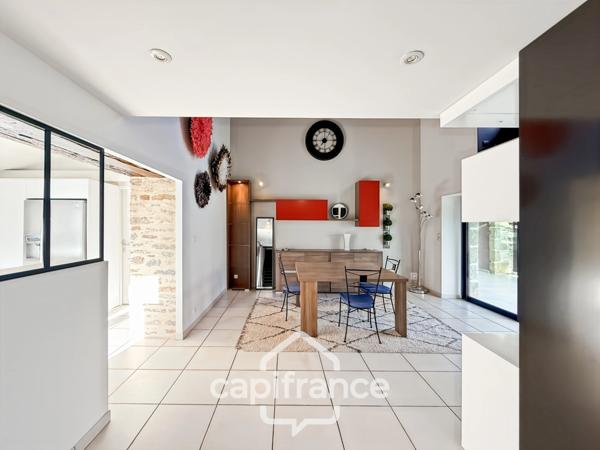 Maison en pierre rénovée – 300 m² habitables – 10 pièces – Terrain 2 800 m² – Réguiny – Garage – Vie de plain-pied