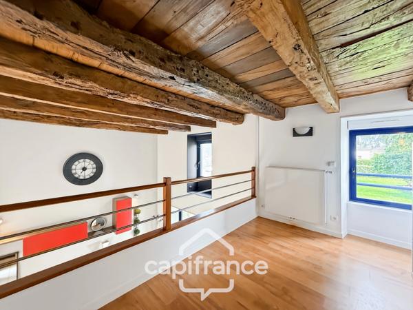 Maison en pierre rénovée – 300 m² habitables – 10 pièces – Terrain 2 800 m² – Réguiny – Garage – Vie de plain-pied