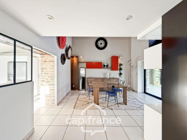 Maison en pierre rénovée – 300 m² habitables – 10 pièces – Terrain 2 800 m² – Réguiny – Garage – Vie de plain-pied