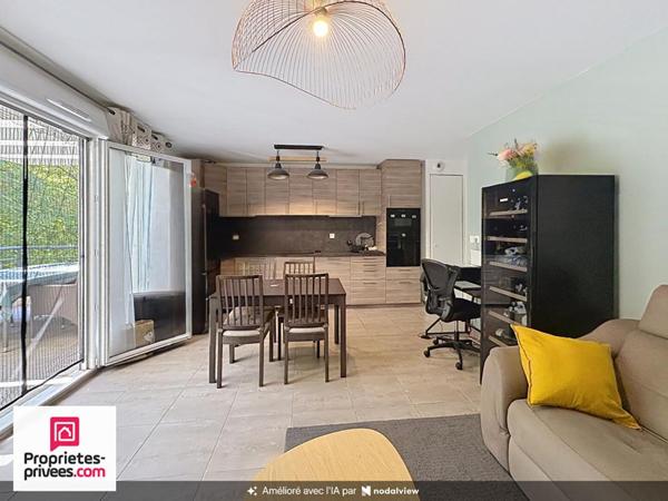 Appartement T4 dernier étage avec deux terrasses et garage