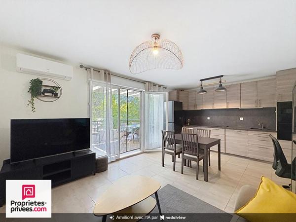 Appartement T4 dernier étage avec deux terrasses et garage