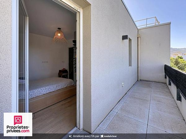 Appartement T4 dernier étage avec deux terrasses et garage