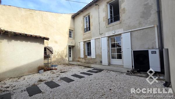 Maison de village avec 3 chambres et grand garage attenant