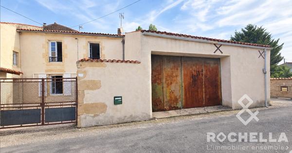 Maison de village avec 3 chambres et grand garage attenant