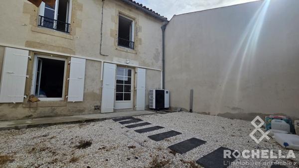 Maison de village avec 3 chambres et grand garage attenant