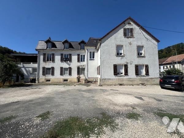 IMMEUBLE ENTIER HERIMONCOURT 360 m2 AVEC PARKINGS PRIVES ET CAVES