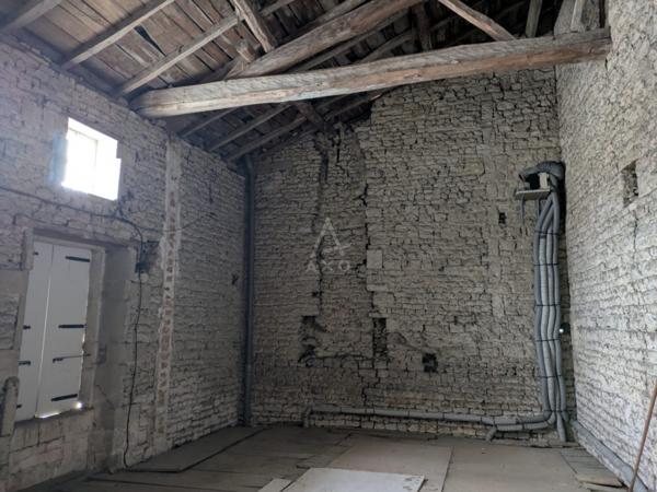 Centre ville de Matha, commerce et logement