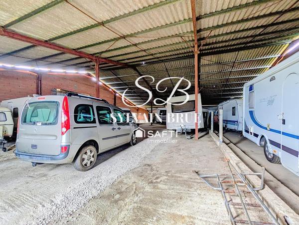 Propriété de 161m² avec 900m² de hangars et ateliers