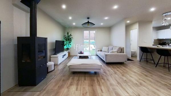 Une maison où il fait bon vivre, au cœur d’un quartier recherché.