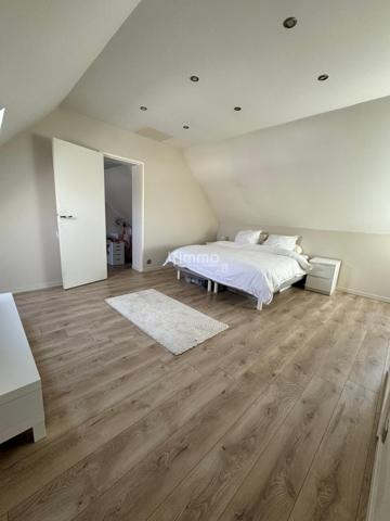 Une maison où il fait bon vivre, au cœur d’un quartier recherché.