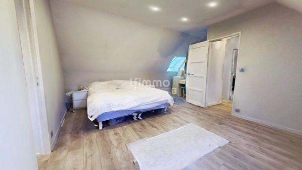 Une maison où il fait bon vivre, au cœur d’un quartier recherché.