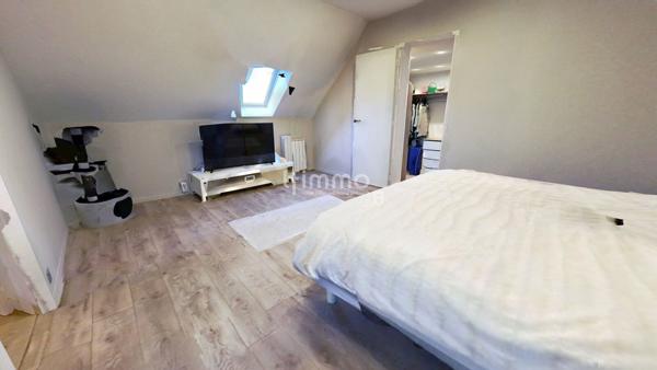 Une maison où il fait bon vivre, au cœur d’un quartier recherché.