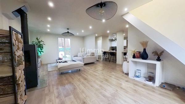 Une maison où il fait bon vivre, au cœur d’un quartier recherché.