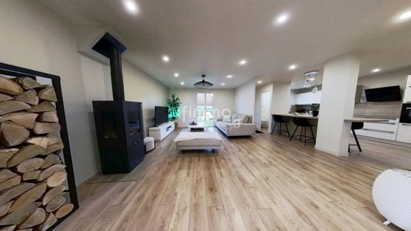 Une maison où il fait bon vivre, au cœur d’un quartier recherché.