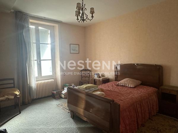 Maison cossue, centre ville de Questembert, 4 chambres, 400 m² de terrain.