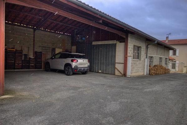 Maison de ville avec environnement idéal pour familles ou artisan