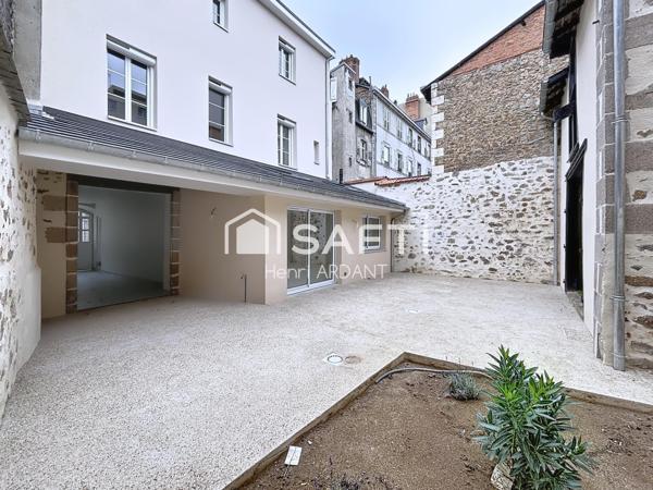 MAGNIFIQUE : hyper fonctionnel en plein Centre-ville avec garage deux ou trois véhicules
