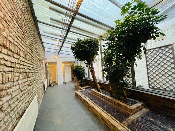 A LOUER APPARTEMENT EN RDC PLEIN CENTRE VILLE DE ST QUENTIN 02100.