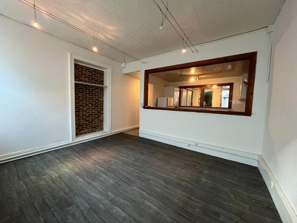 A LOUER APPARTEMENT EN RDC PLEIN CENTRE VILLE DE ST QUENTIN 02100.