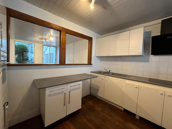 A LOUER APPARTEMENT EN RDC PLEIN CENTRE VILLE DE ST QUENTIN 02100.