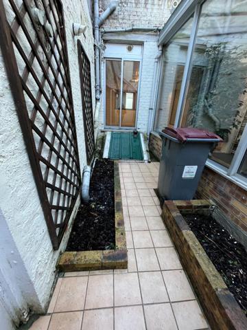 A LOUER APPARTEMENT EN RDC PLEIN CENTRE VILLE DE ST QUENTIN 02100.