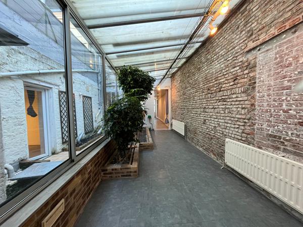 A LOUER APPARTEMENT EN RDC PLEIN CENTRE VILLE DE ST QUENTIN 02100.