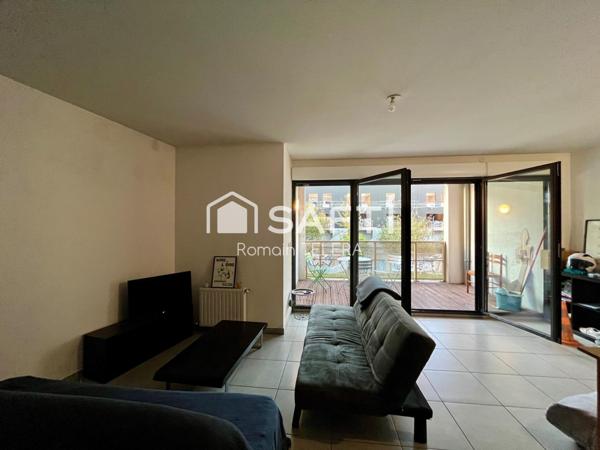 Belcier : T3 loué, de 63 m² avec un balcon et une place de parking.