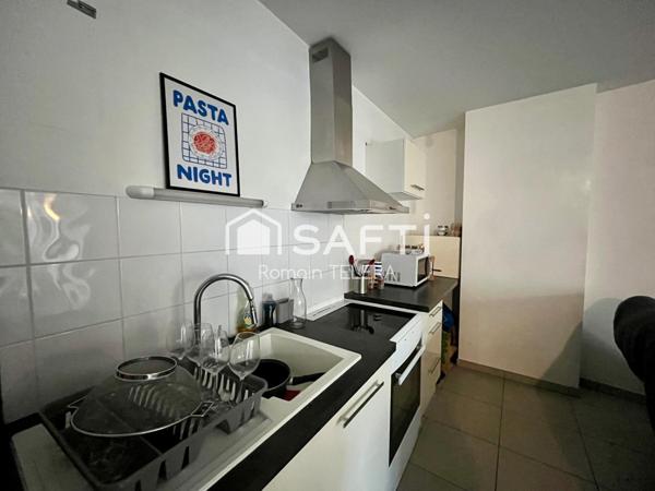 Belcier : T3 loué, de 63 m² avec un balcon et une place de parking.