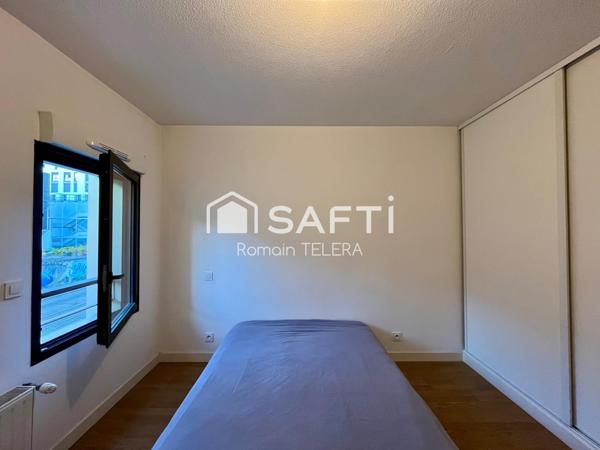 Belcier : T3 loué, de 63 m² avec un balcon et une place de parking.