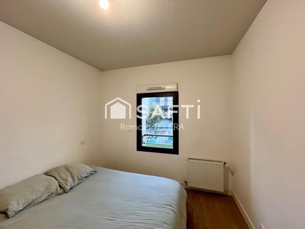 Belcier : T3 loué, de 63 m² avec un balcon et une place de parking.