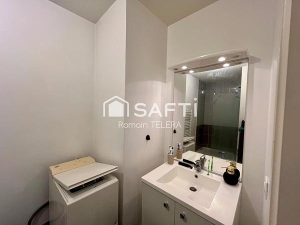 Belcier : T3 loué, de 63 m² avec un balcon et une place de parking.