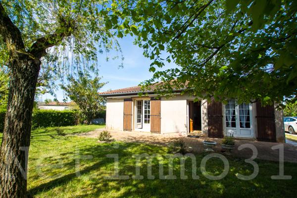 Maison avec garage et jardin