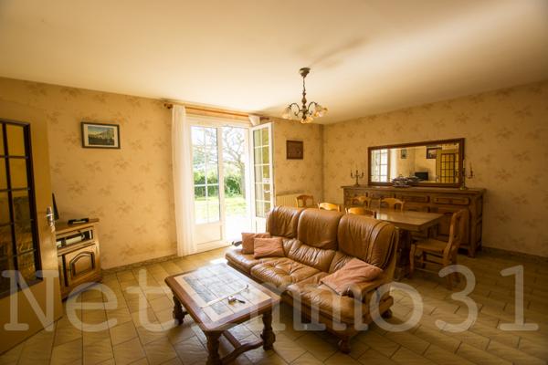 Maison avec garage et jardin