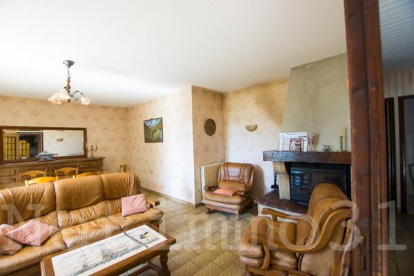 Maison avec garage et jardin